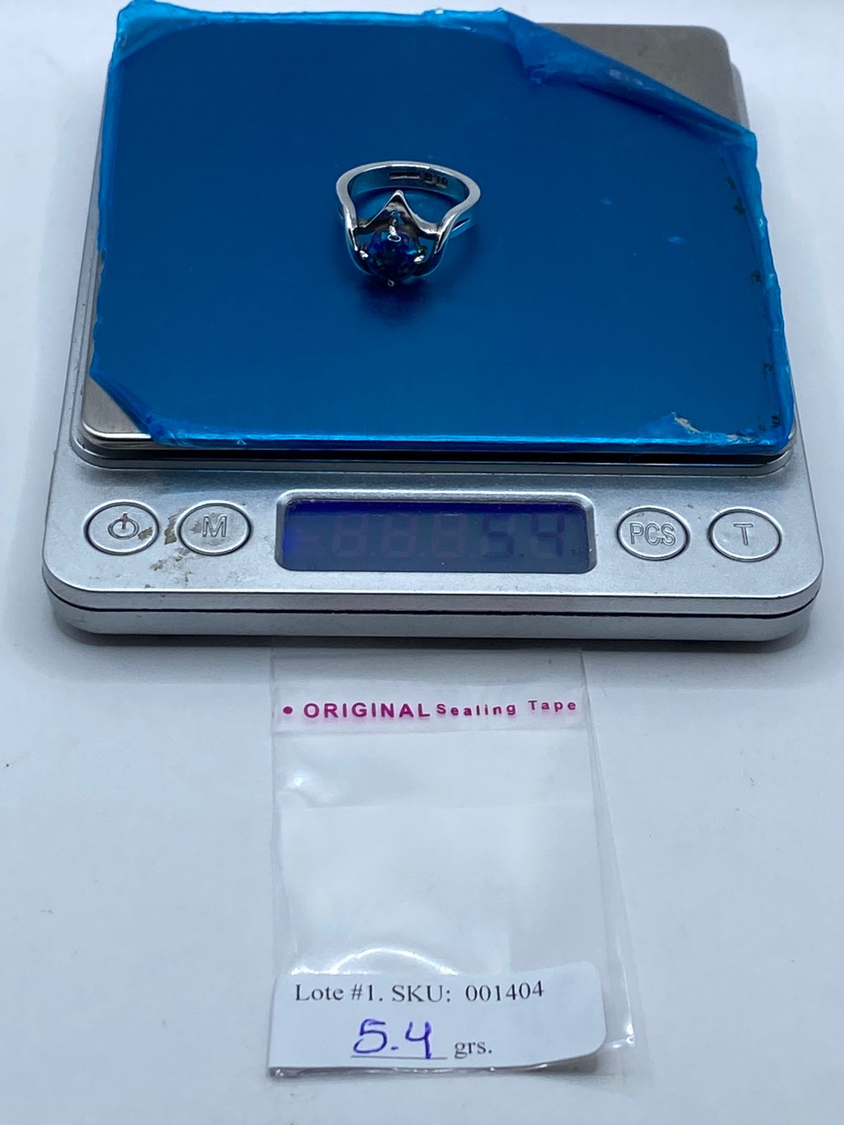 Anillo Contemporáneo de Plata .925 con Ópalo de Fuego, peso en gramos (báscula)