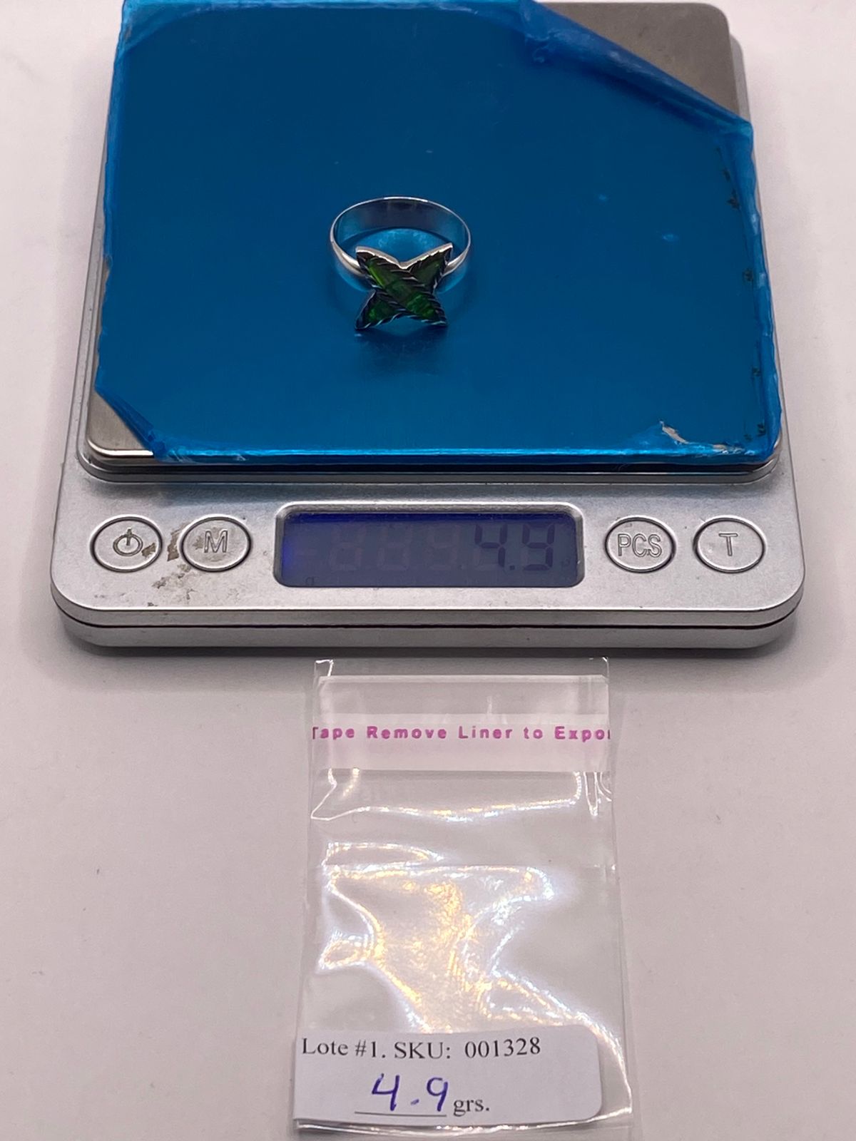 Anillo de Estrella en Plata Ley 950 con Ópalo Verde Azul, peso en gramos (báscula)