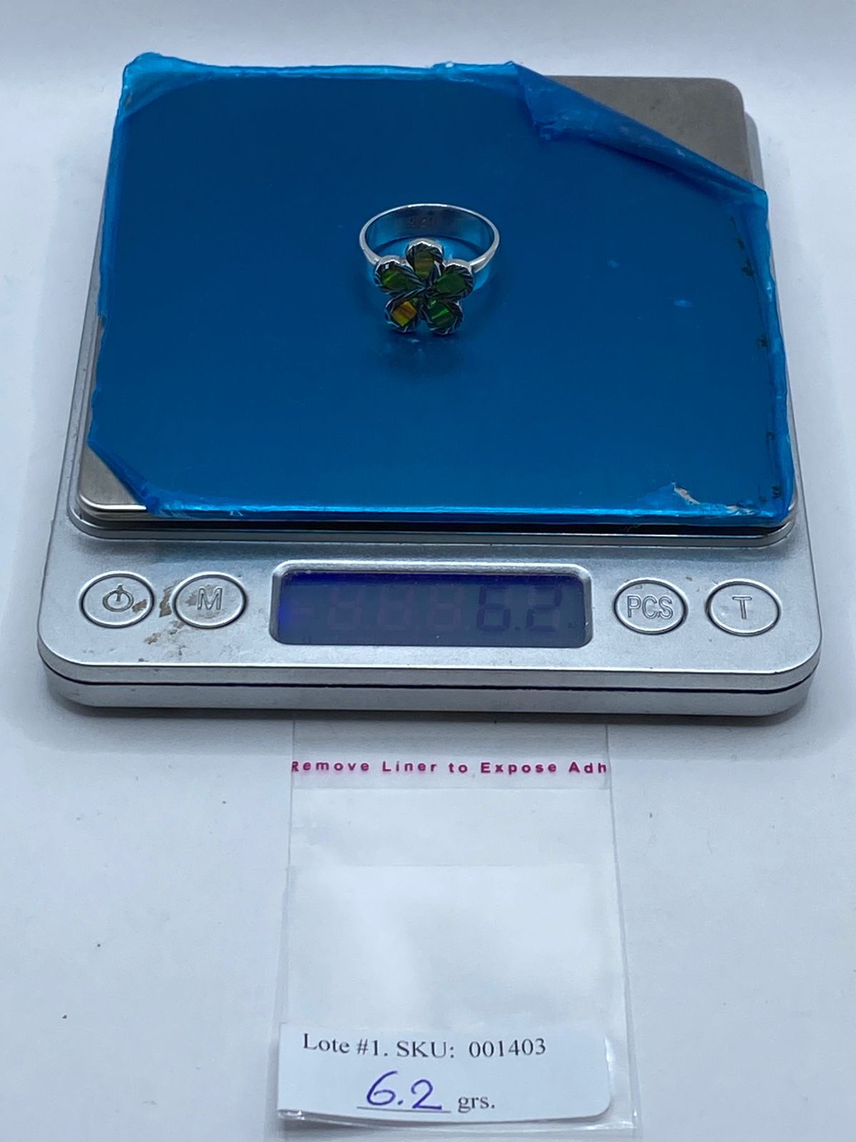 Anillo Flor de Plata .950 con Ópalo de Fuego, peso en gramos (báscula)