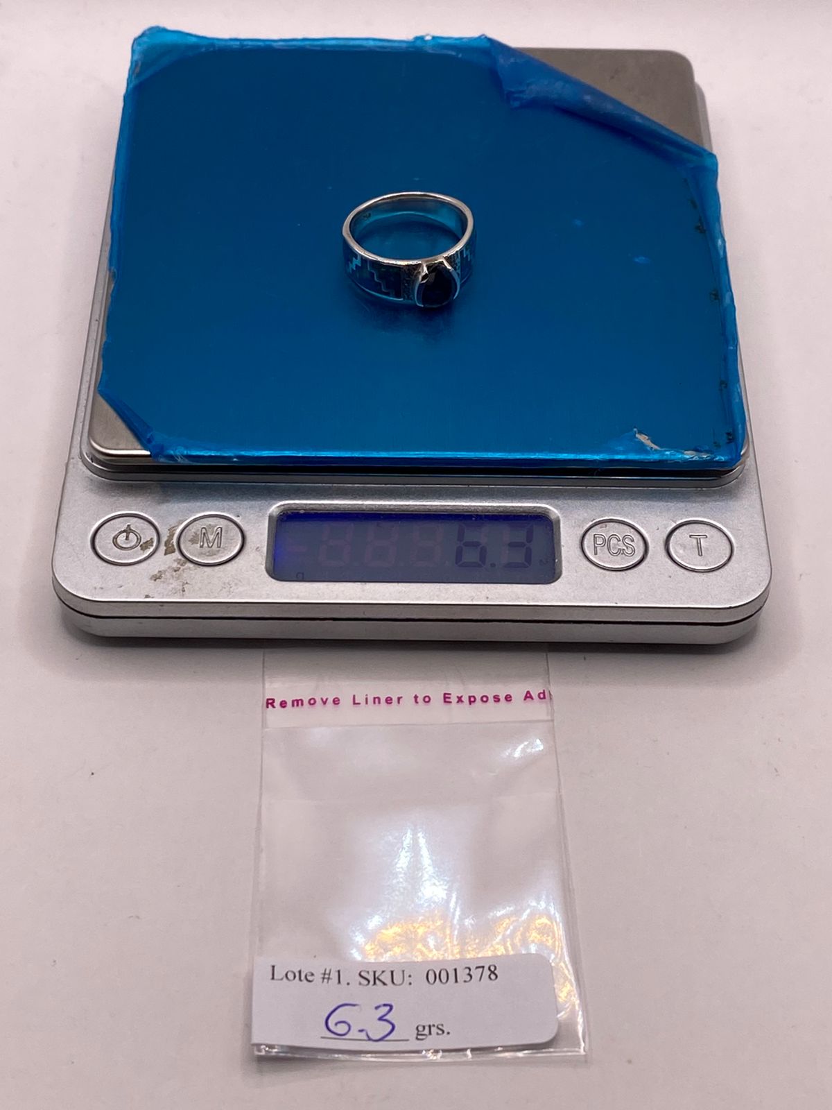 Anillo Greca con Ópalo de Fuego y Zirconia en Plata Ley .950, peso en gramos (báscula)