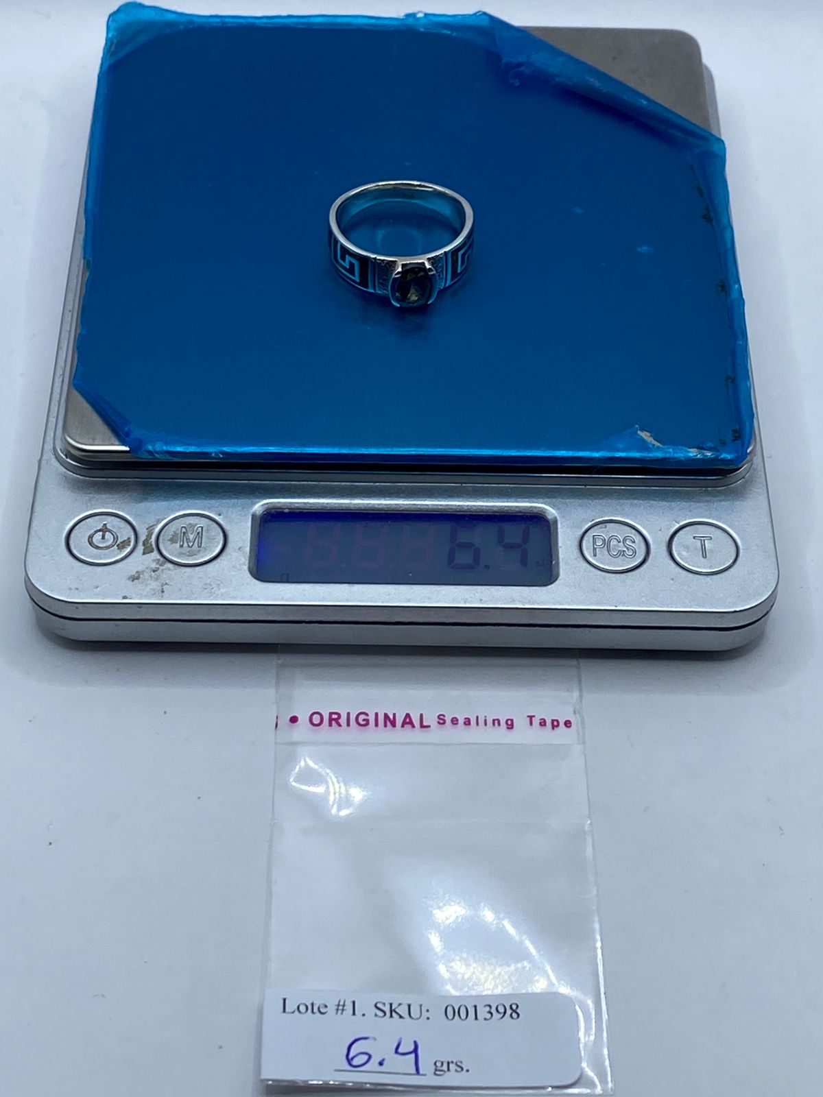 Anillo Greca de Plata .950 con Ópalo de Fuego y Zirconia Tornasol, peso en gramos (báscula)