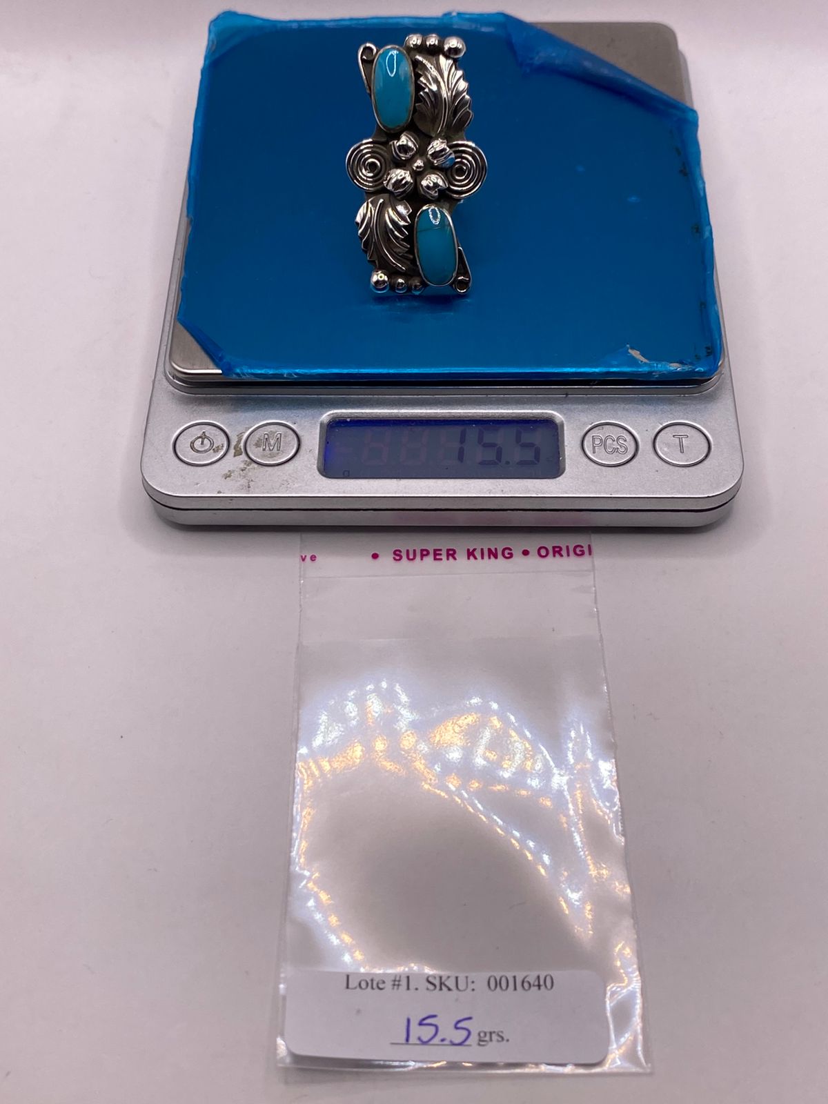 Anillo Navajo de Pluma de Plata Ley 925 con Turquesa, peso en gramos (báscula)