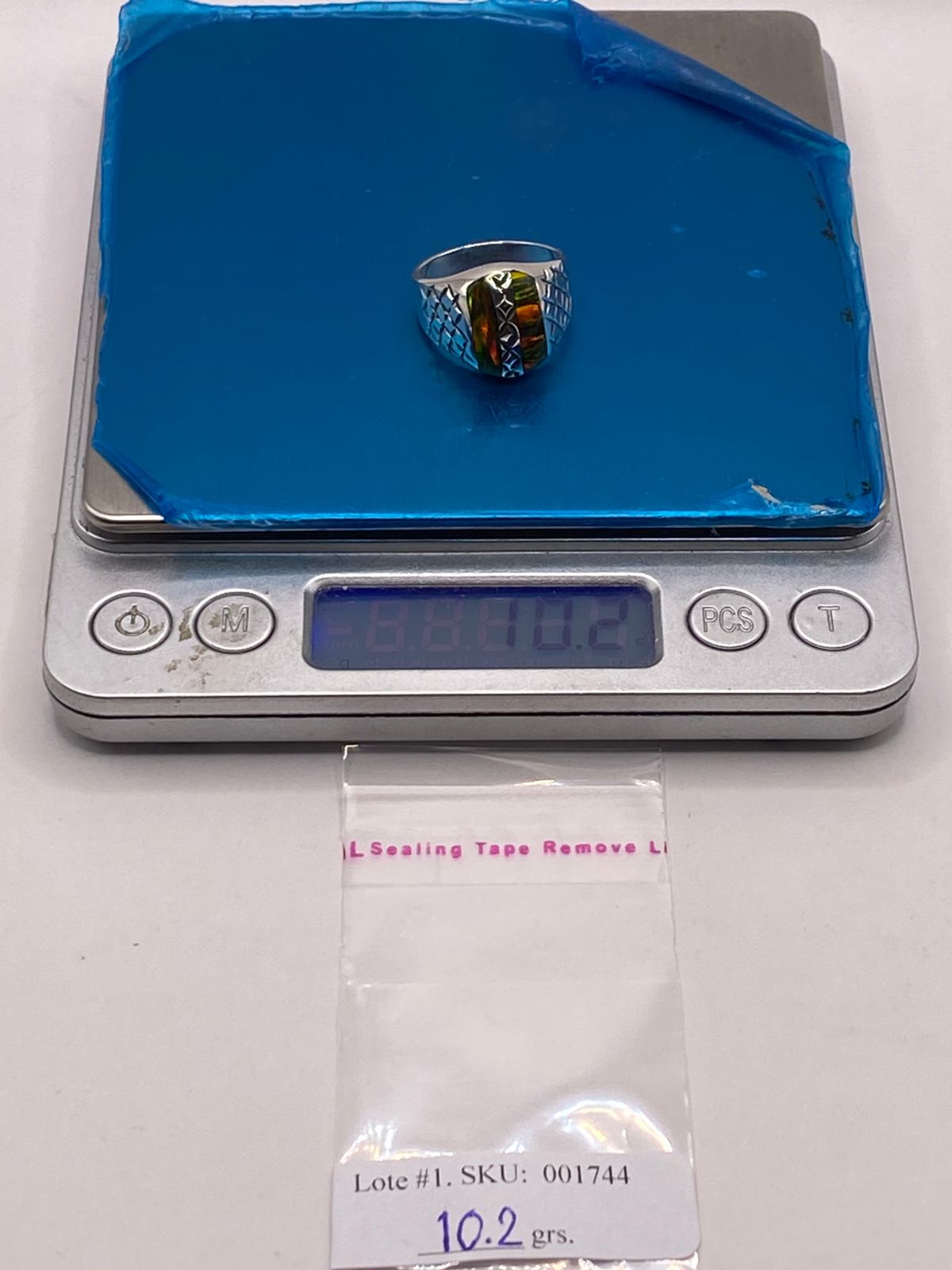 Anillo con Ópalo de Fuego Multicolor en Plata Ley .950, peso en gramos (báscula)