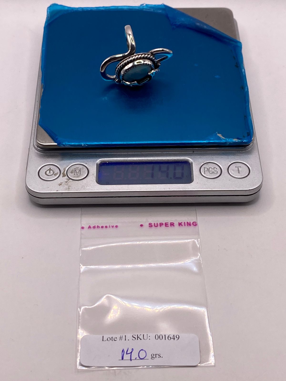 Anillo de Plata Ley 925 con Ágata Azul y Figura Kokopelli, peso en gramos (báscula)