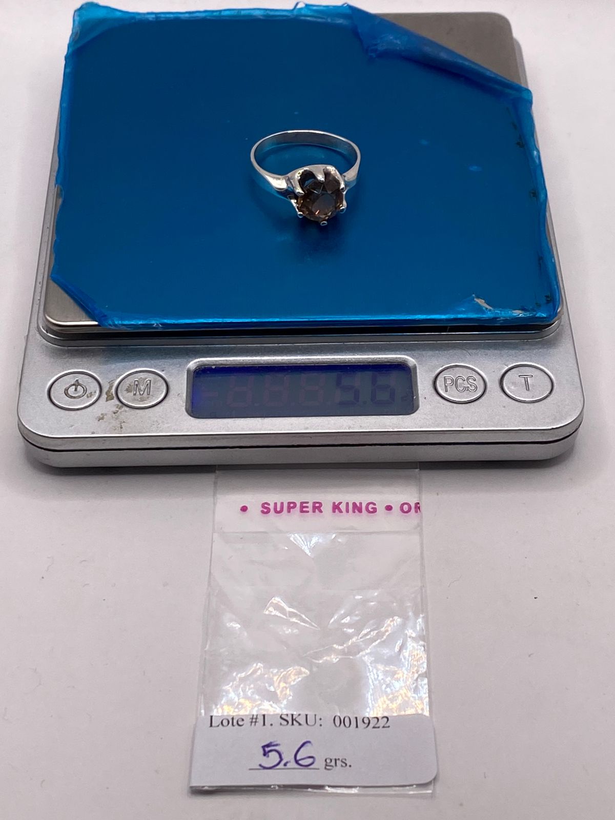 Anillo de Plata Ley 925 con Zirconia Color Champagne, peso en gramos (báscula)