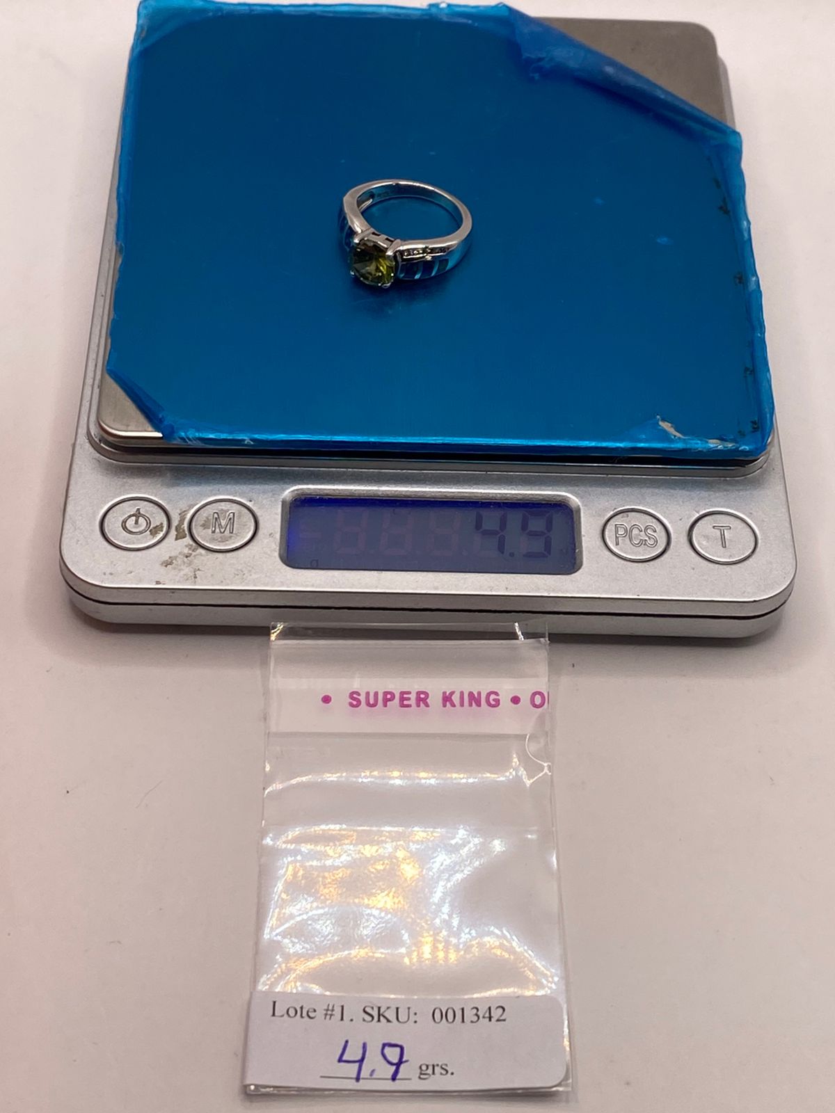 Anillo de Plata Ley 925 con Zirconia Verde Olivo, Ópalo de Fuego y Zirconias, peso en gramos (báscula)
