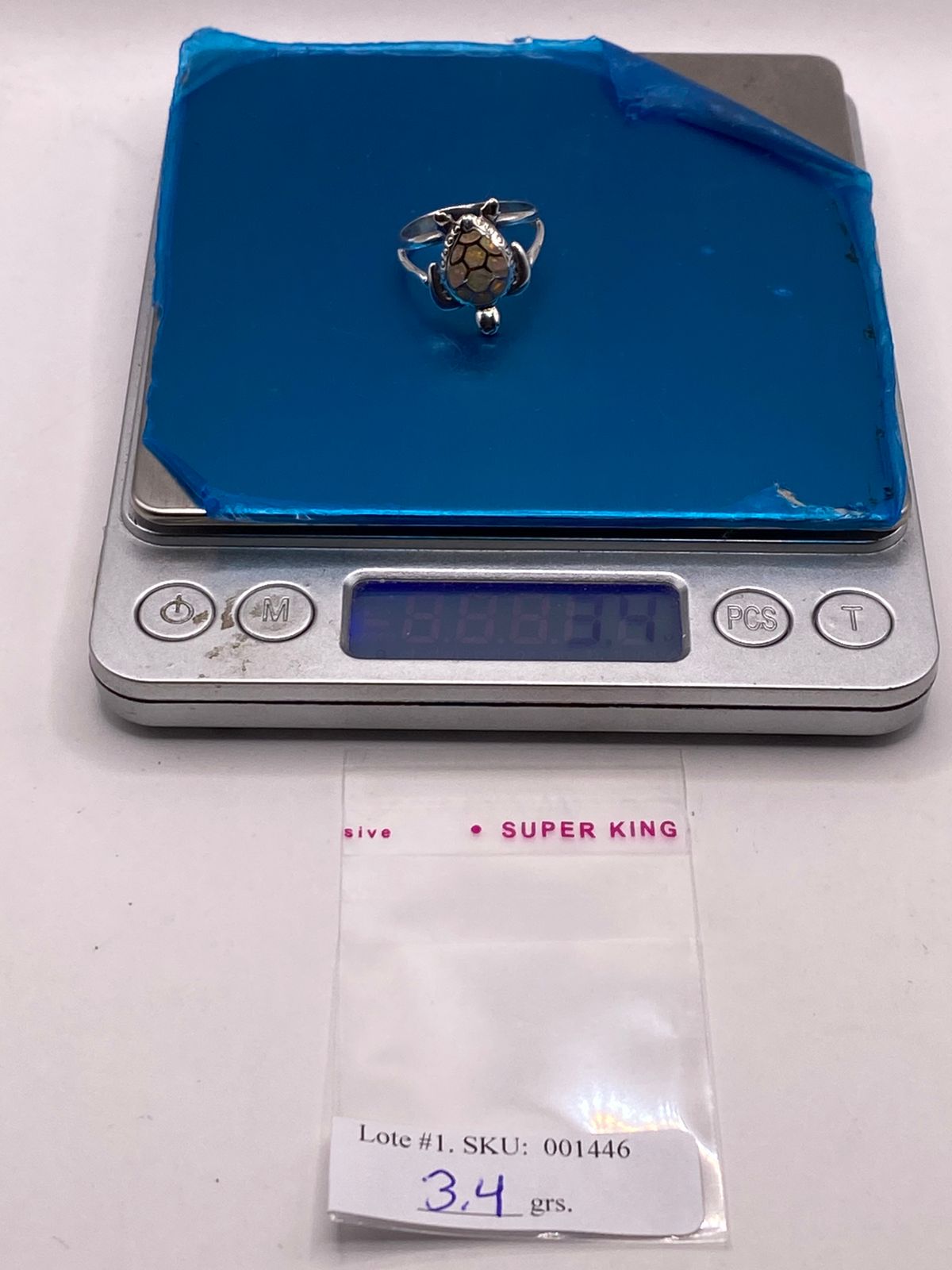 Anillo Tortuga Marina de Plata Ley 950 con Ópalo de Fuego Tornasol, peso en gramos (báscula)
