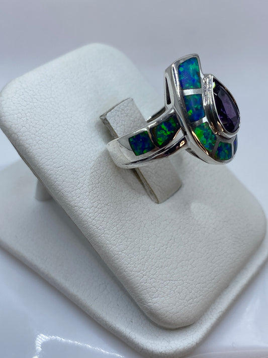 Vista frontal del anillo coctel de ópalo natural en forma de herradura, plata .925