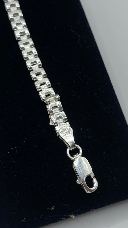 Detalle del eslabón y broche de seguridad de plata con marca .925 TAXCO visible — prueba de autenticidad