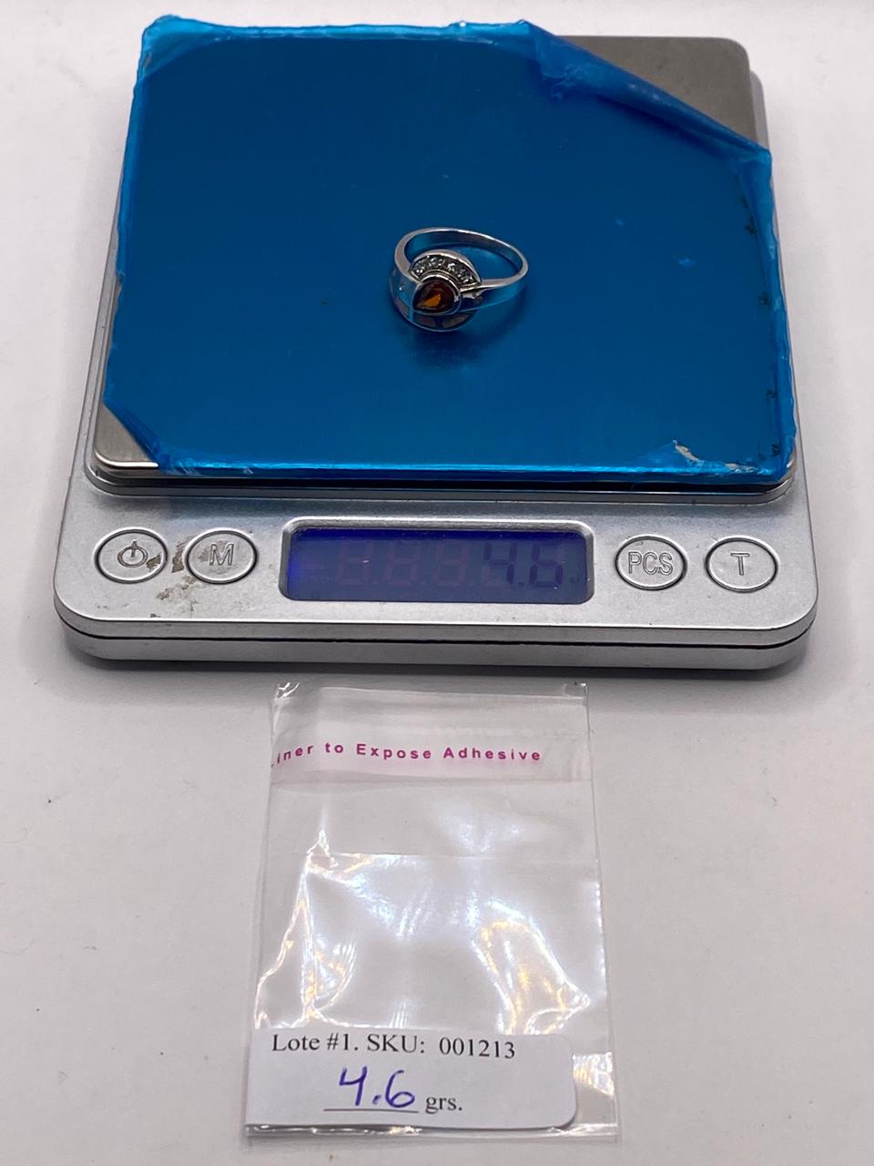 Anillo Diseño Curvo de Plata 925 con Ópalo de Fuego y Zirconia, peso en gramos (báscula)
