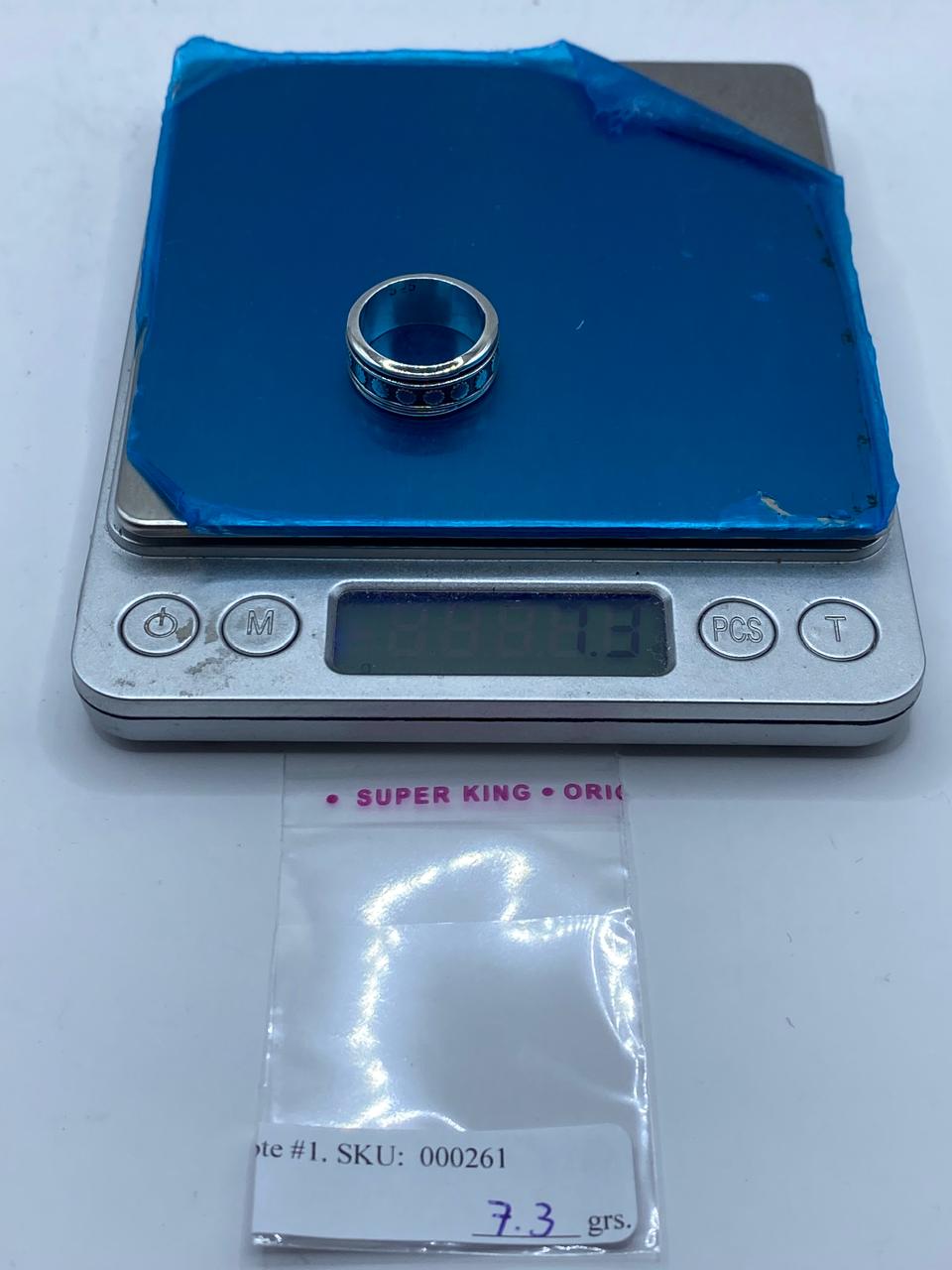 Anillo Giratorio de Plata 925 con Caritas de Sol, peso en gramos (báscula)