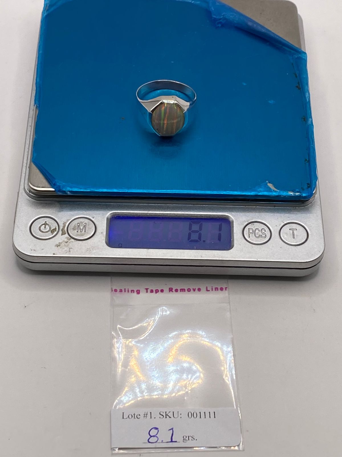 Anillo Octagonal con Ópalo de Fuego en Plata .950, peso en gramos (báscula)