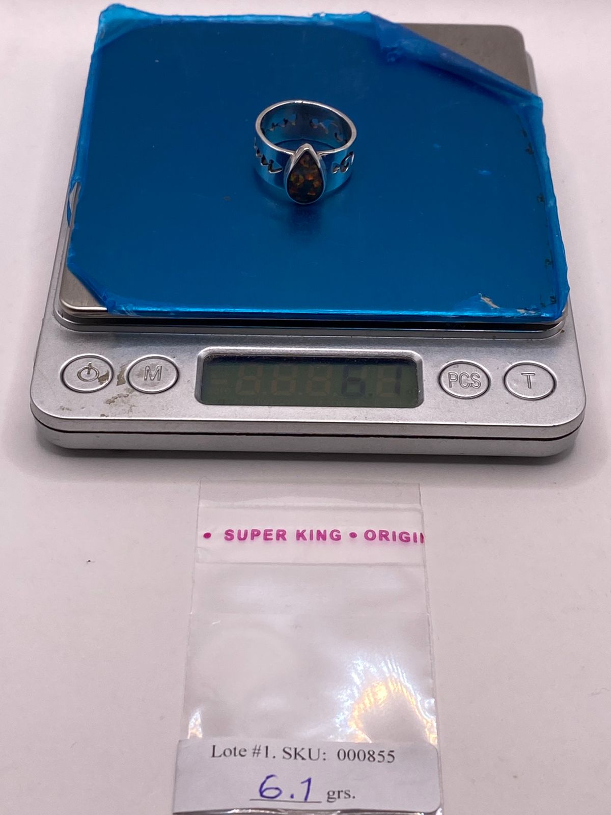 Anillo con Piedra Ópalo de Fuego en Forma de Gota en Plata Ley 950, peso en gramos (báscula)