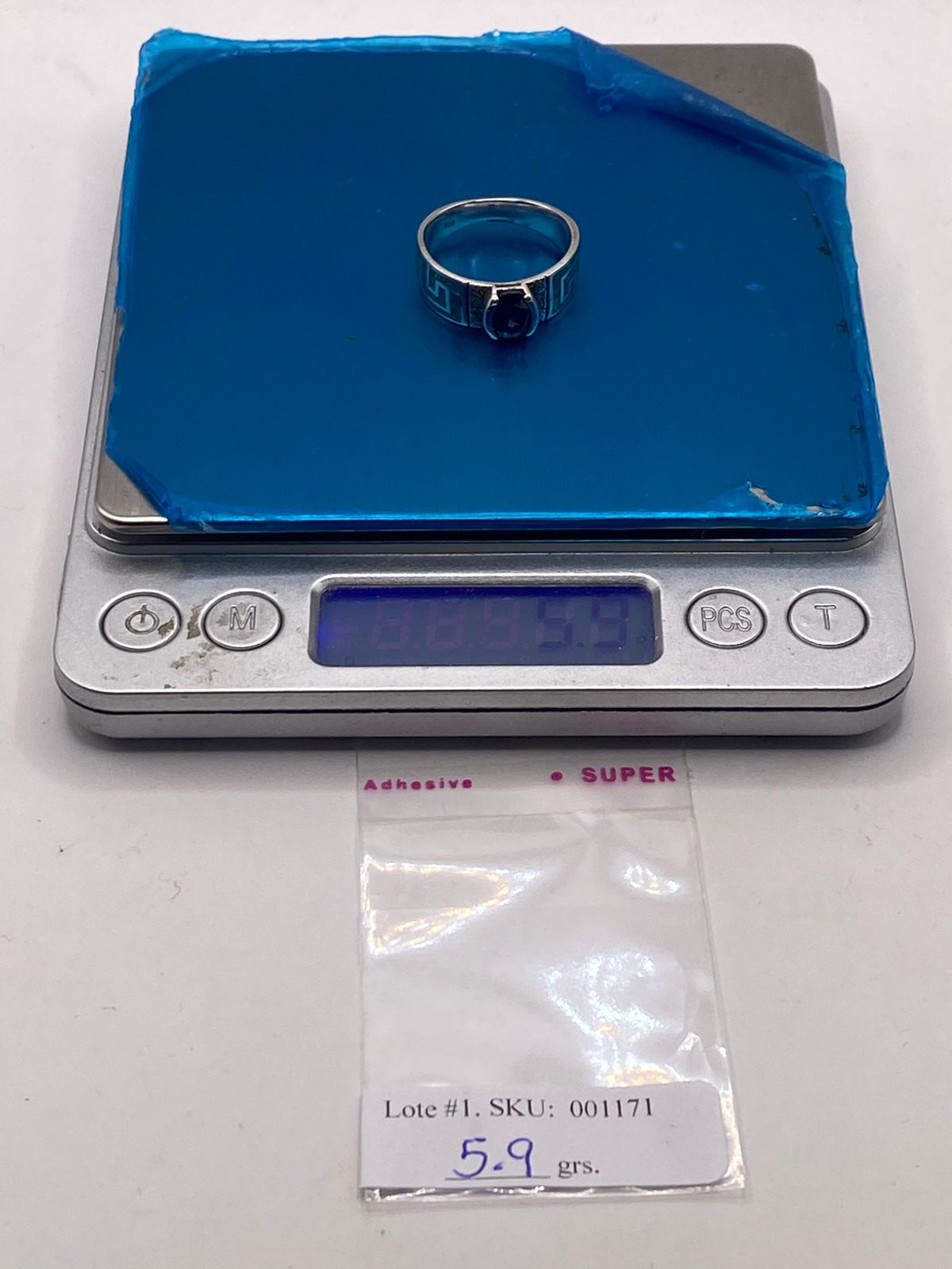 Anillo de Plata 950 con Ópalo de Fuego y Zirconia Azul, peso en gramos (báscula)