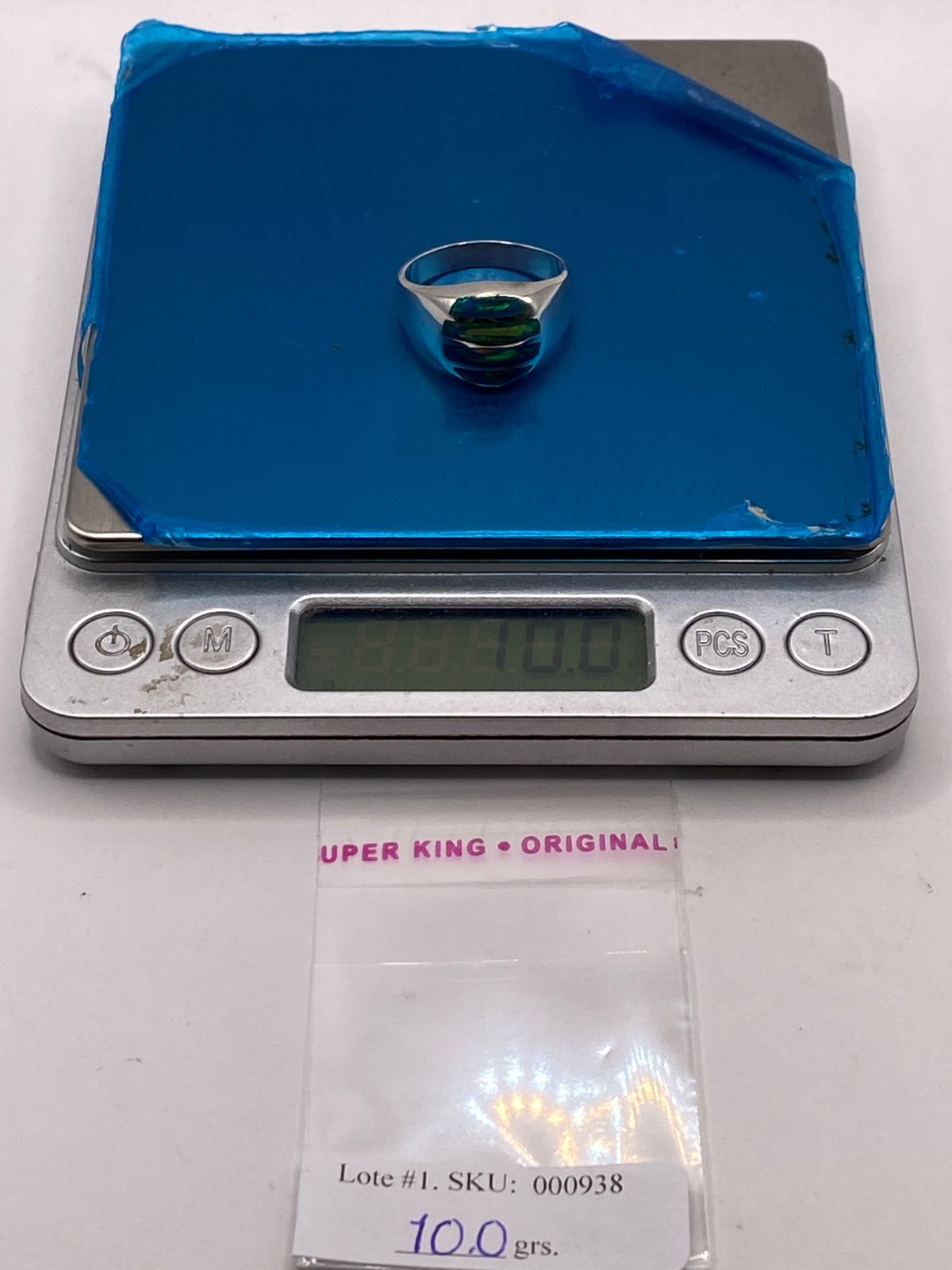 Anillo en Plata Ley 950 con Ópalo de Fuego Diseño Ovalado Segmentado, peso en gramos (báscula)