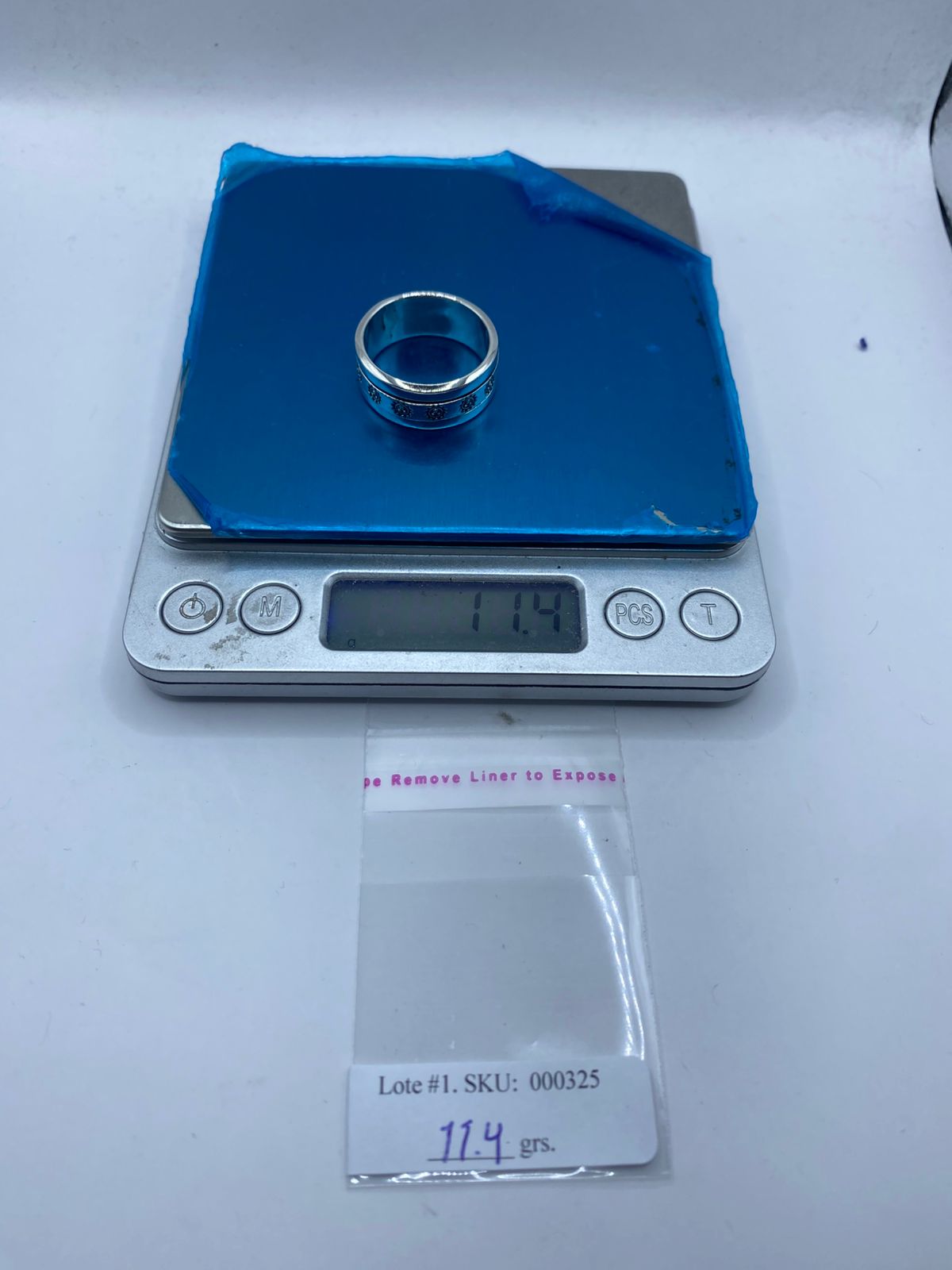 Anillo Spinner de Plata .925 con Diseño de Soles, peso en gramos (báscula)