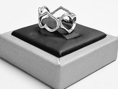 Anillo Calado de Corazones en Plata Ley 925, sello de autenticidad Plata Ley .925
