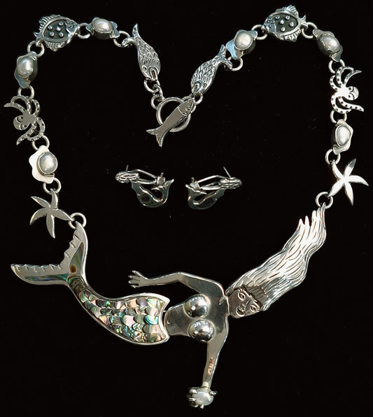 Sello de ley en el interior del set de collar con incrustaciones de abulon en plata ley 925