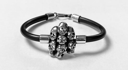 Sello de ley en el interior del brazalete de siete craneos en plata ley 925 con caucho