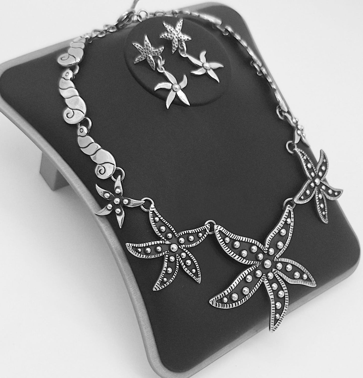 Set de Collar y Arete, Estrella de Mar de Plata Ley 925., sello de autenticidad Plata Ley .925