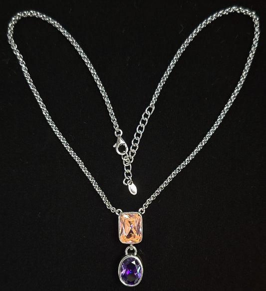 Sello de ley en el interior del collar con inrustaciones de topacio rosa y amatista en plata ley 925