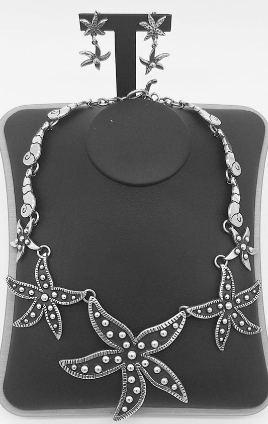 Sello de ley en el interior del set de collar y arete, estrella de mar de plata ley 925.