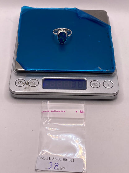 Anillo Ajustable de Plata Ley 925 con Ópalo Azul Ovalado, peso en gramos (báscula)