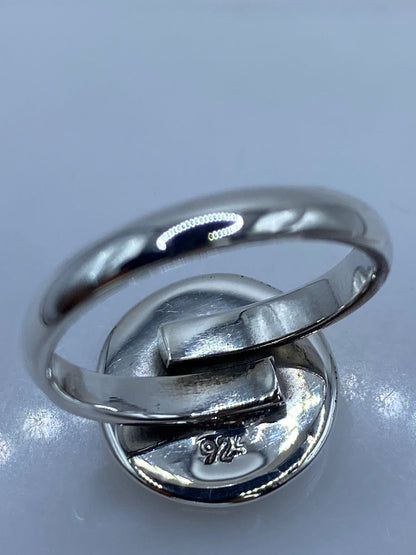 Anillo Ajustable de Plata Ley 925 con Ópalo de Fuego, sello de autenticidad Plata Ley .925