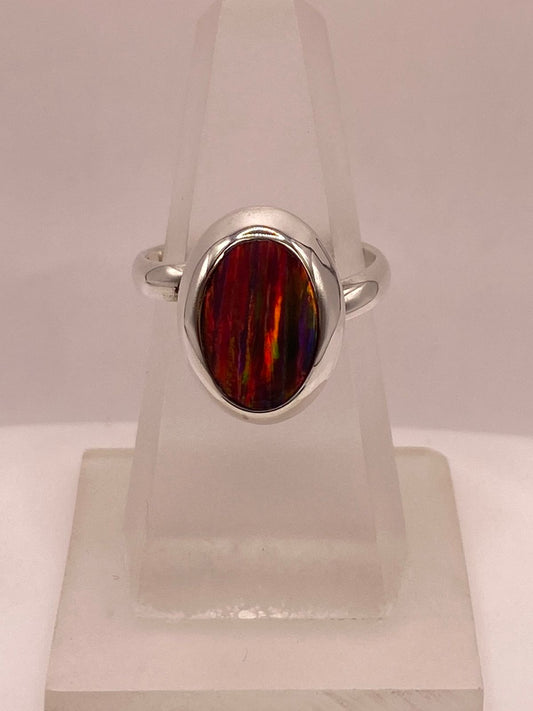 Anillo Ajustable de Plata Ley .925 con Ópalo de Fuego Ovalado en báscula mostrando peso
