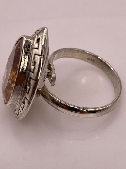 Anillo Ajustable de Plata Ley 925 con Zirconia Ámbar Tipo Gota, sello de autenticidad Plata Ley .925