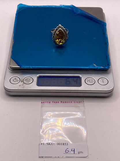Anillo Ajustable de Plata 925 con Zirconia Gota, Diseño Calado, peso en gramos (báscula)