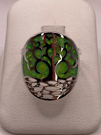 Anillo Árbol de la Vida con Ópalo de Fuego en Plata Ley .950 en báscula mostrando peso