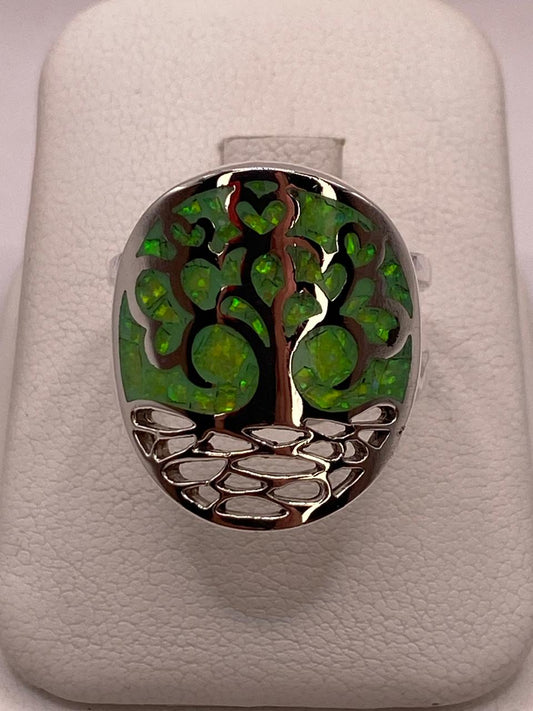 Anillo Árbol de la Vida con Ópalo de Fuego en Plata Ley .950 en báscula mostrando peso