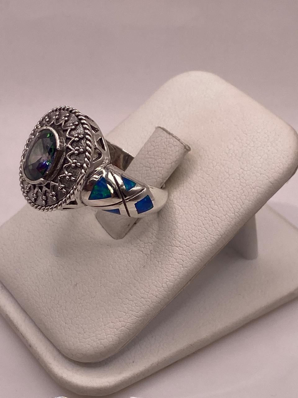 Anillo Artesanal con Ópalo de Fuego, Zirconia y Marquesita en Plata Ley .950, vista lateral