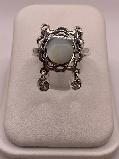 Anillo Artesanal de Plata Ley 925 con Nácar Natural en báscula mostrando peso
