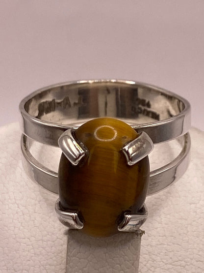 Anillo Artesanal de Plata Ley 925 con Ojo de Tigre Natural, sello de autenticidad Plata Ley .925