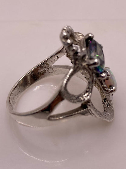 Anillo Artesanal de Plata Ley 950 con Ópalo de Fuego y Zirconia Tornasol, sello de autenticidad Plata Ley .925