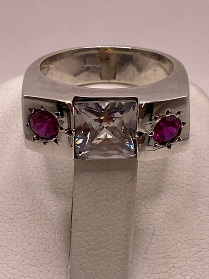 Anillo Artesanal con Zirconia Blanca y Fucsia en Plata Ley .925, sello de autenticidad Plata Ley .925