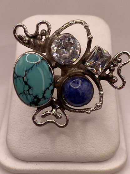 Anillo Artístico de Plata Ley 925 con Turquesa, Sodalita y Zirconias, vista lateral