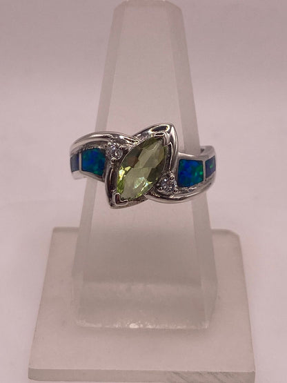Anillo Bypass Ópalo Azul & Zirconia Peridoto Plata 925 — ángulo diagonal