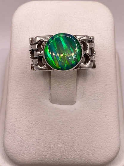 Anillo Calado con Ópalo Azul y Verde Ovalado en Plata Ley 950, vista lateral