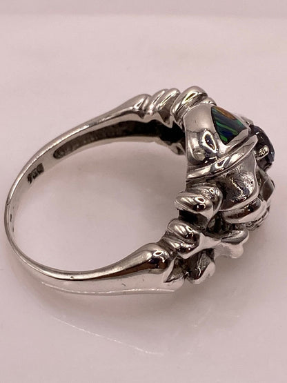 Anillo Calavera de Plata Ley 950 con Ópalo de Fuego y Zirconia Lila, vista superior