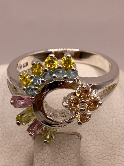 Anillo Circular Multicolor de Plata 925 con Zirconias, sello de autenticidad Plata Ley .925