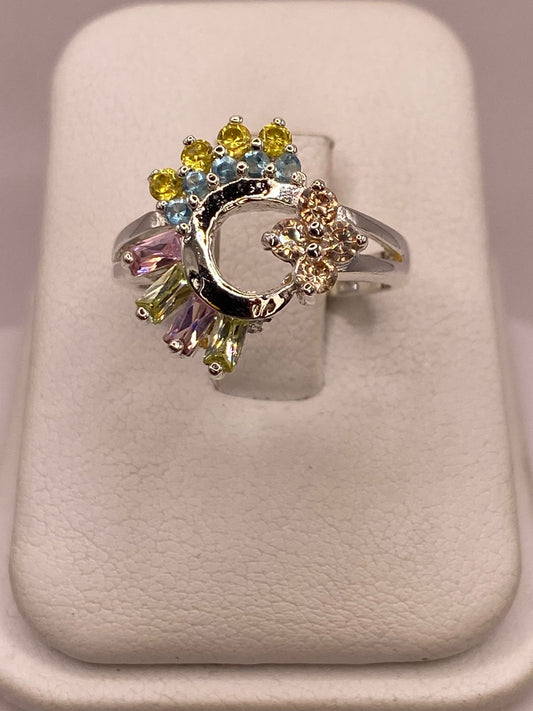 Anillo Circular Multicolor de Plata 925 con Zirconias en báscula mostrando peso