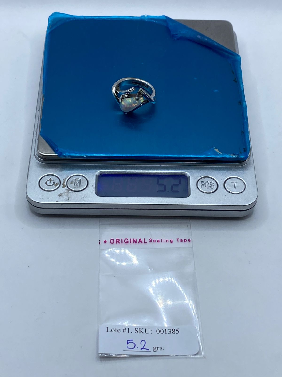 Anillo Contemporáneo con Ópalo de Fuego Tornasol en Plata .925, peso en gramos (báscula)