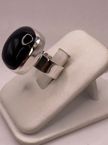 Anillo Contemporáneo de Plata Ley 925 con Ónix Negro, sello de autenticidad Plata Ley .925