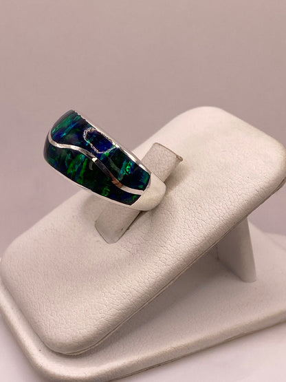 Anillo Contemporáneo de Plata Ley 925 con Ópalo de Fuego Azul Marino, vista lateral
