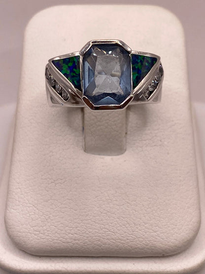 Anillo Contemporáneo de Plata Ley 925 con Ópalo de Fuego y Zirconia Azul Celeste, vista superior