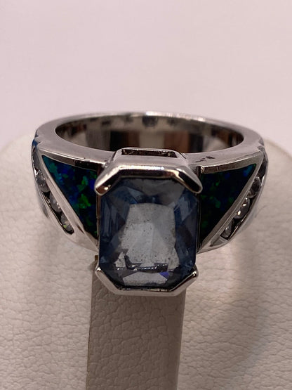 Anillo Contemporáneo de Plata Ley 925 con Ópalo de Fuego y Zirconia Azul Celeste, vista posterior