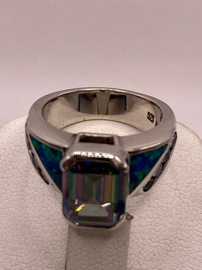 Anillo Contemporáneo de Plata Ley 925 con Ópalo de Fuego y Zirconia Tornasol, sello de autenticidad Plata Ley .925